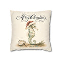 Coastal Christmas Seahorse pillow cover featuring watercolor holiday artwork on soft faux suede, styled as festive beach house decor for a sofa, chair, bedroom or coastal living room.